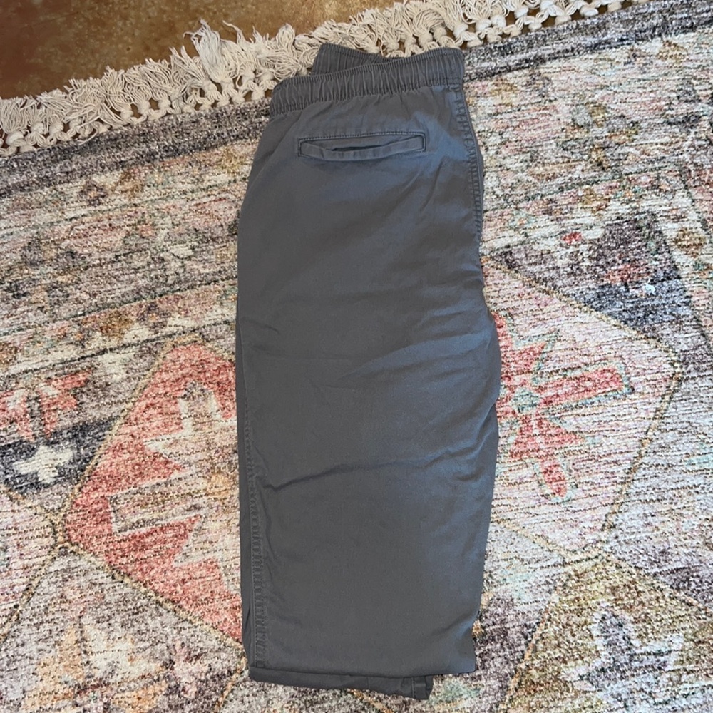 Men’s fitted dress pants, cuff at bottom on the pant